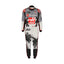 Kevin Magnussen's 2023 Miami Grand Prix F1 racing suit, front view: navy blue base with red and white accents, featuring a prominent star design on the leg and subtle stripes in the background.