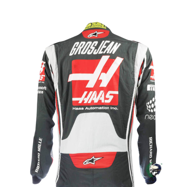 Back view of Romain Grosjean’s 2017 racing suit, featuring embroidered sponsor logos, number placements, and aerodynamic fit for racing performance.