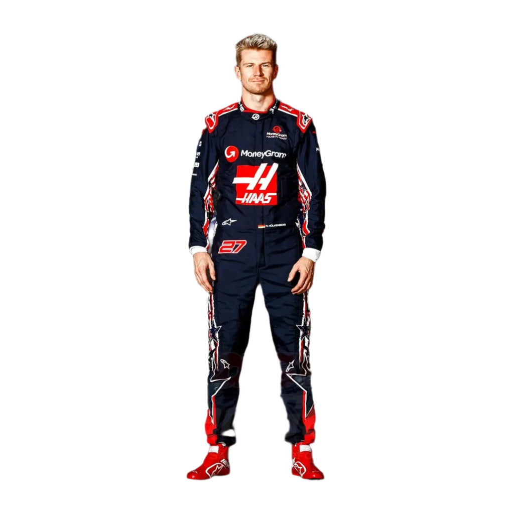 Nico Hülkenberg standing confidently in his 2023 Austin Grand Prix racing suit, featuring a deep navy blue base adorned with red accents and subtle star patterns Main image