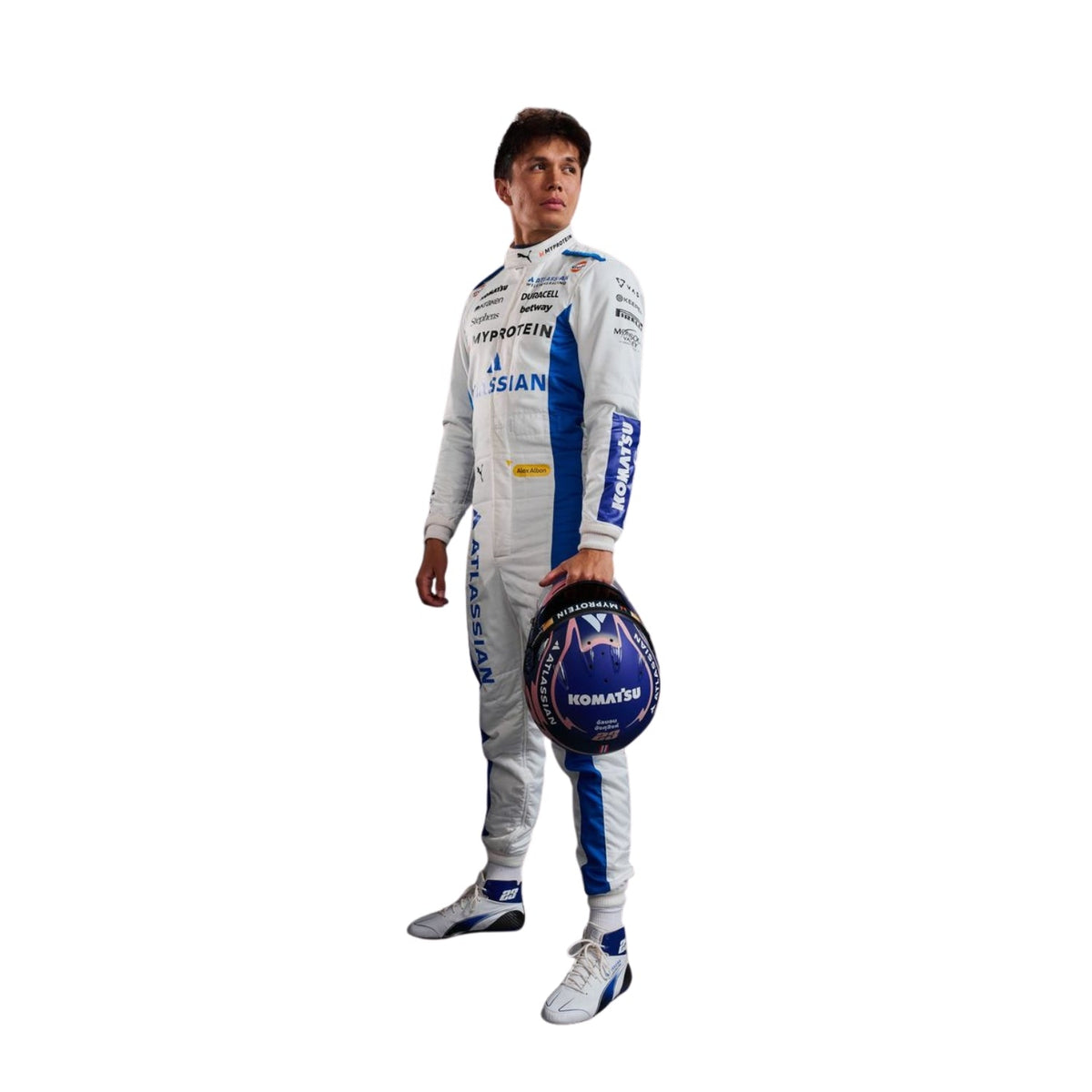 Side profile of Alex Albon in his 2025 Formula 1 racing suit, displaying the ergonomic fit and the interplay of white and blue fabrics, enhanced by subtle detailing along the side seams and sponsor branding. Main image
