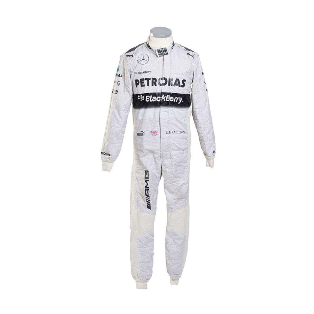 Front view of Lewis Hamilton’s 2014 F1 racing suit in white and teal colors, worn during his championship-winning season showcasing sleek race-ready design. Main image