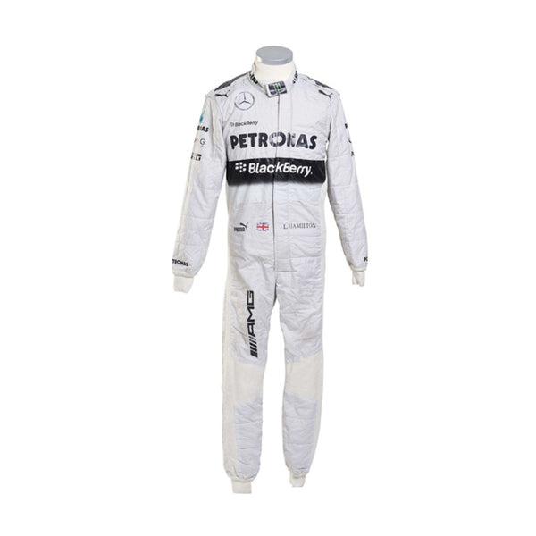Front view of Lewis Hamilton’s 2014 F1 racing suit in white and teal colors, worn during his championship-winning season showcasing sleek race-ready design.