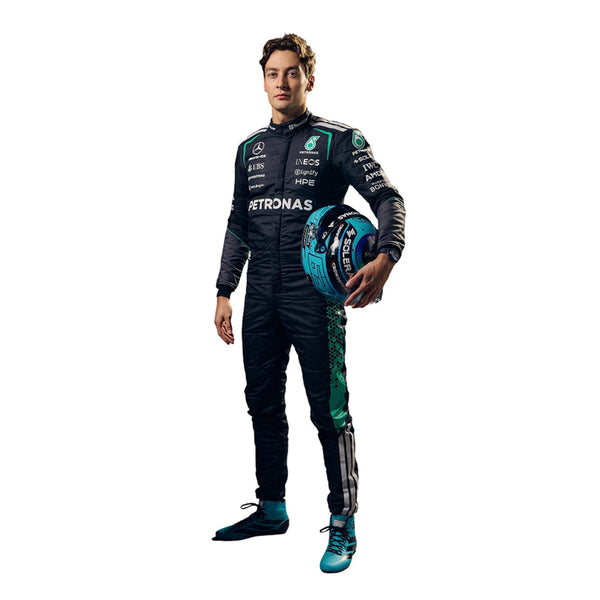 George russell wearing a 2026 mercedes f1 racing suit with Petronas branding.